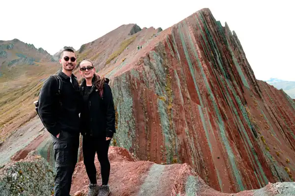 Couple enjoying Pallay Punchu Rainbow Mountain